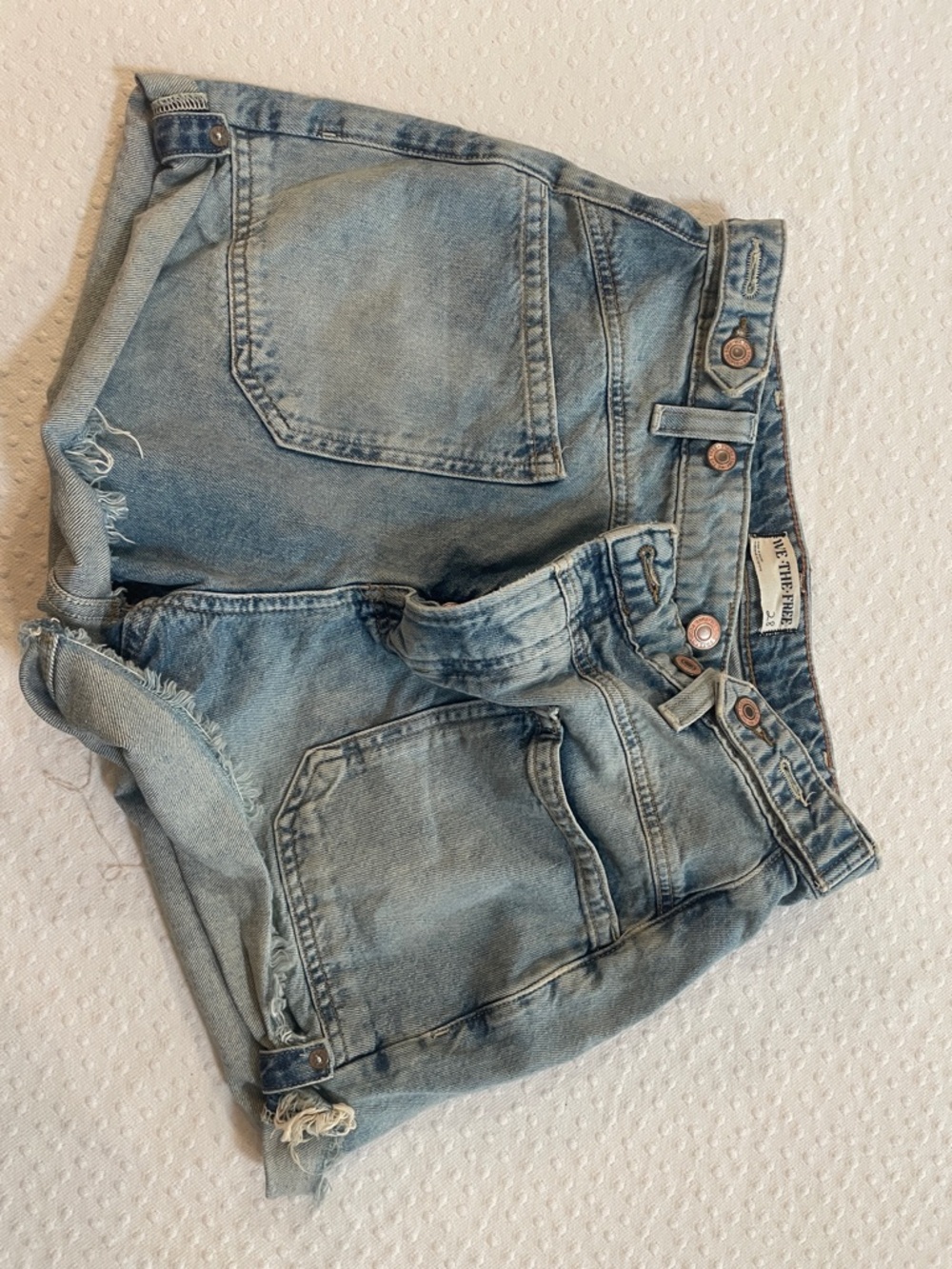We The Free faded light blue denim shorts distressed, adjustable waist 28